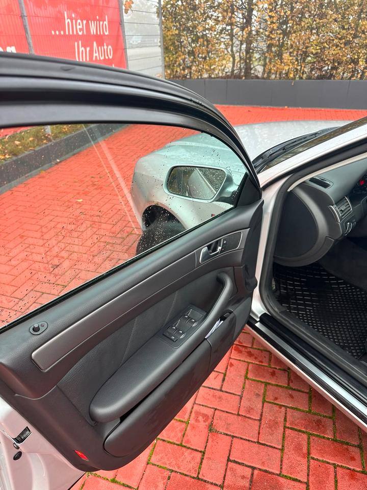 Audi A6 2004 — photo 12