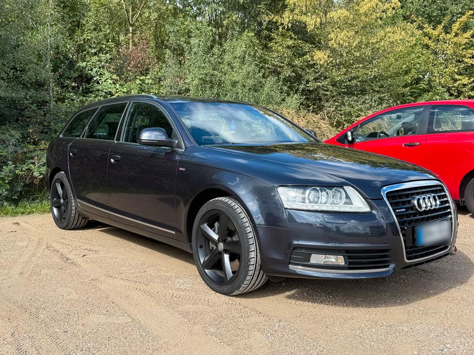 Audi A6 2010 — вигляд ззаду