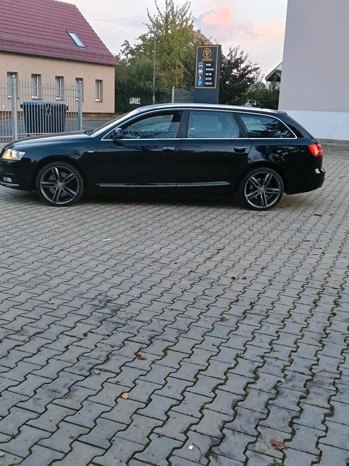 Audi A6 2010 — вигляд ззаду