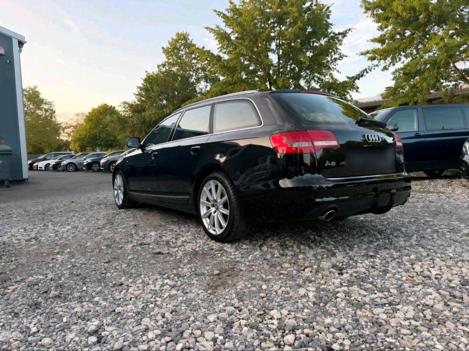 Audi A6 2010 — салон