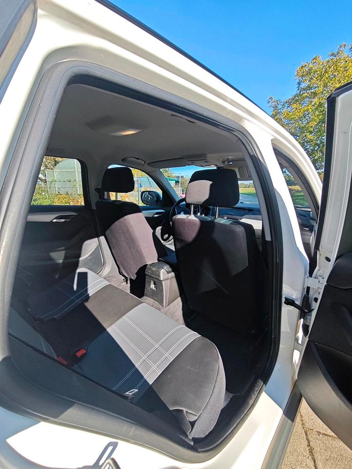 BMW X1 2010 — photo 8