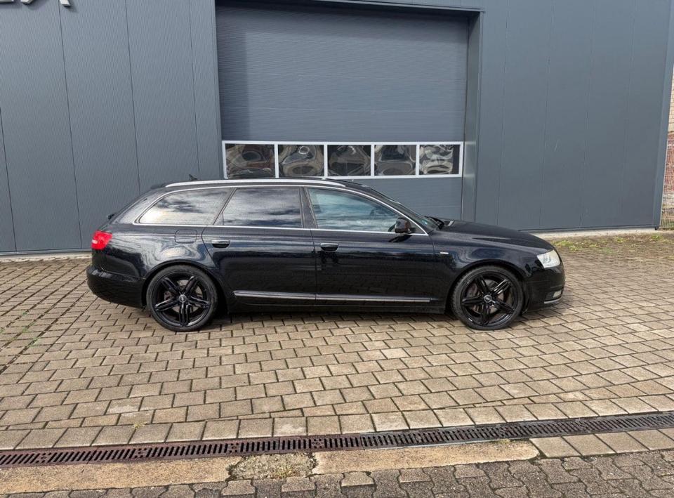 Audi A6 2009 — вигляд ззаду