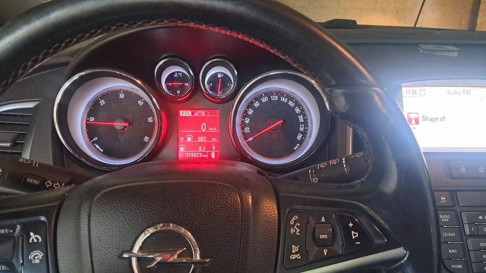 Opel Astra 2013 — photo 13