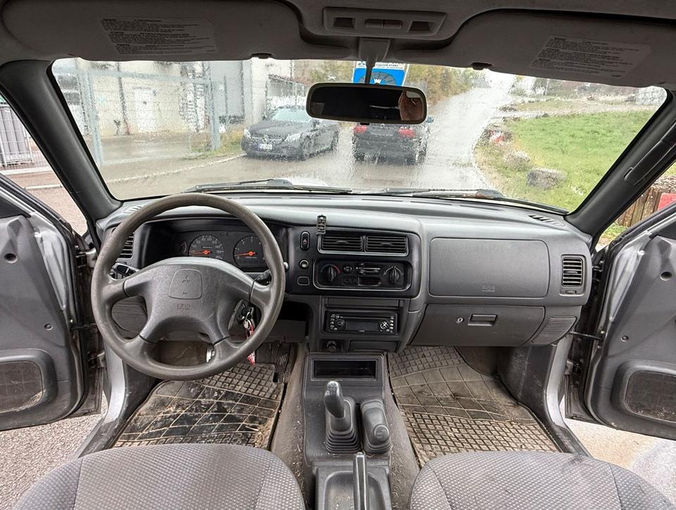 Mitsubishi L200 2004 — photo 11