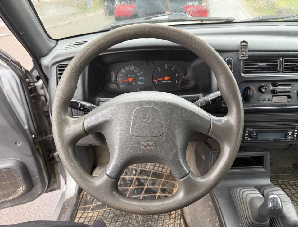 Mitsubishi L200 2004 — photo 14