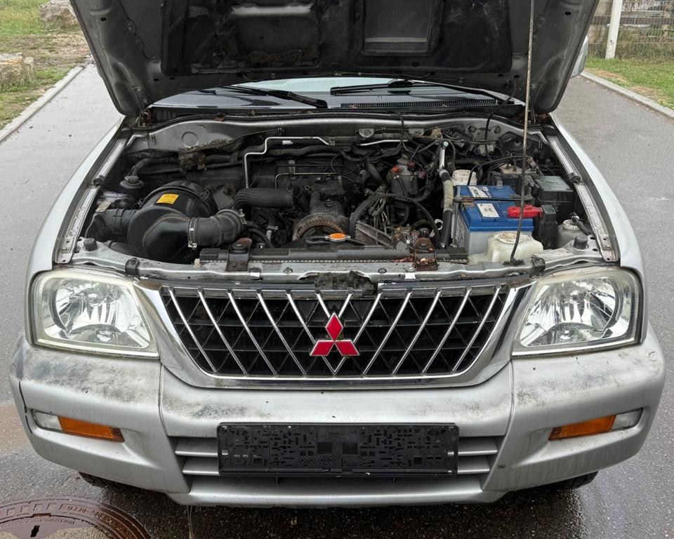 Mitsubishi L200 2004 — photo 16