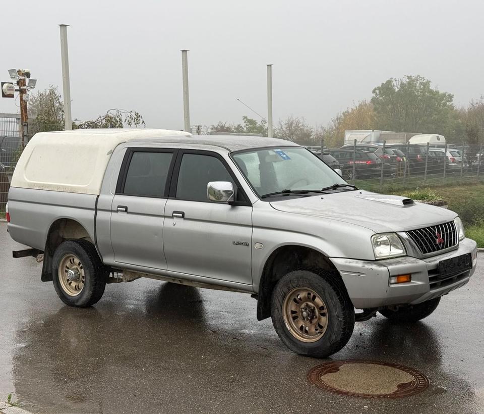 Mitsubishi L200 2004 — photo 5