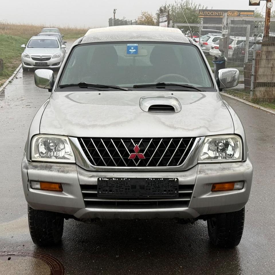 Mitsubishi L200 2004 — photo 6