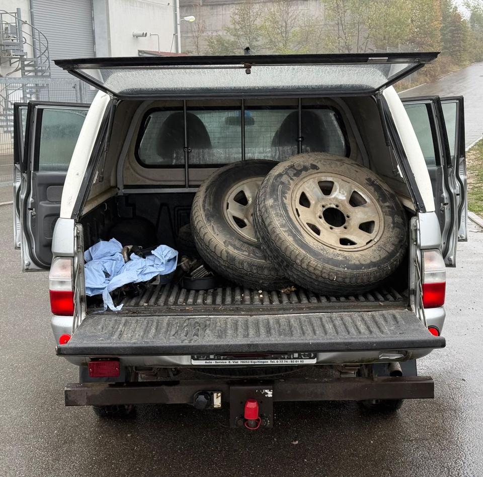 Mitsubishi L200 2004 — photo 7