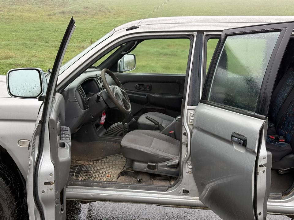 Mitsubishi L200 2004 — photo 8
