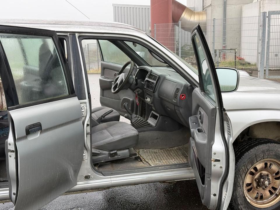 Mitsubishi L200 2004 — photo 9