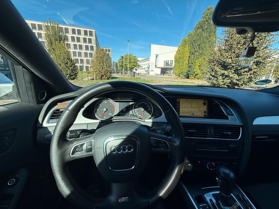 Audi A4 2009 — photo 12