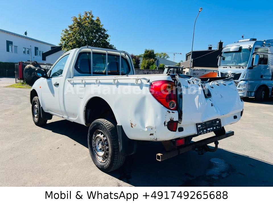 Mitsubishi L200 2008 — photo 11