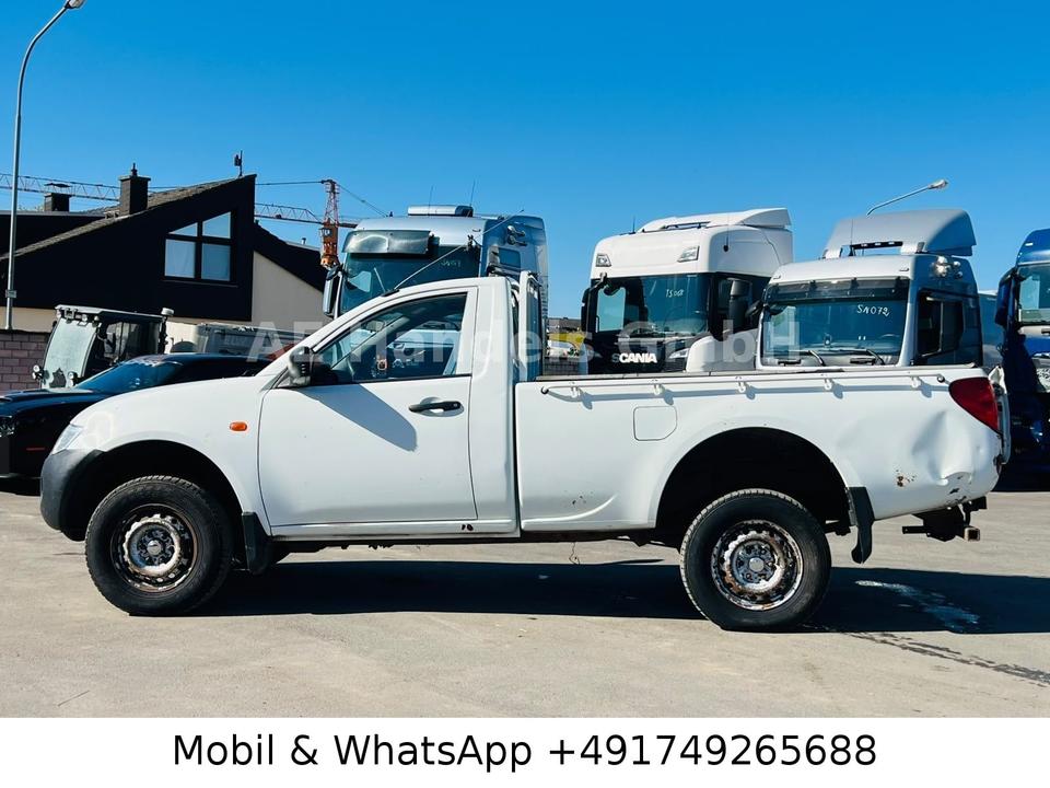 Mitsubishi L200 2008 — photo 14