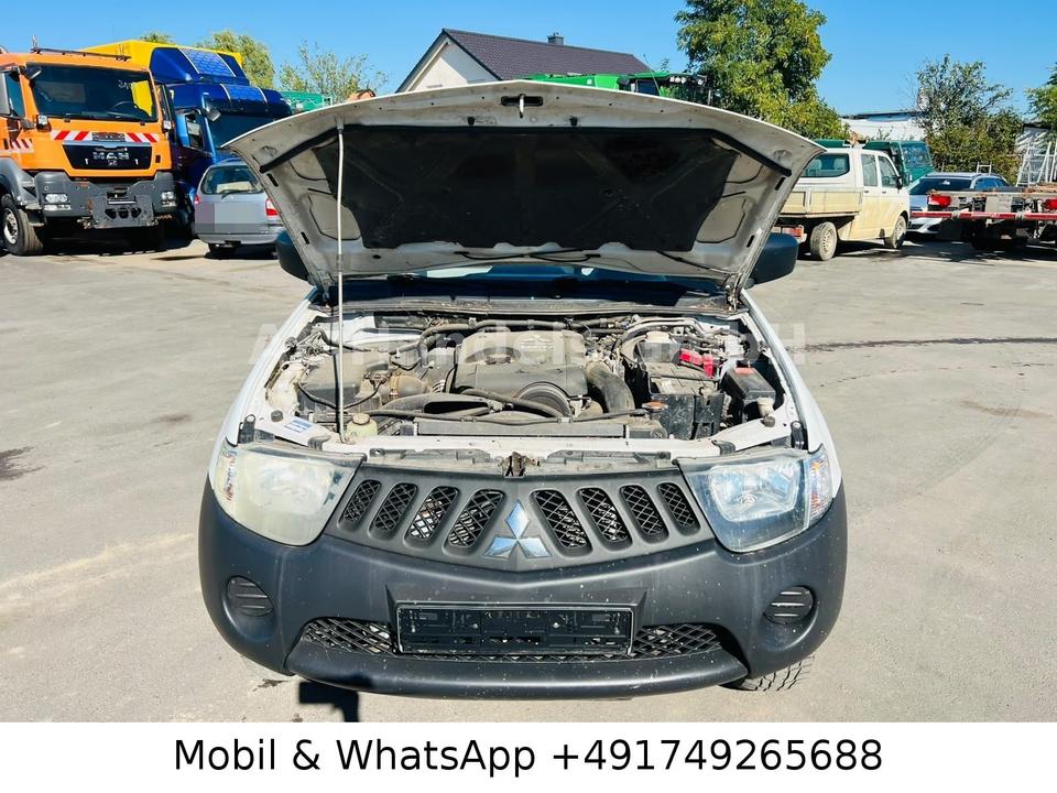 Mitsubishi L200 2008 — photo 18