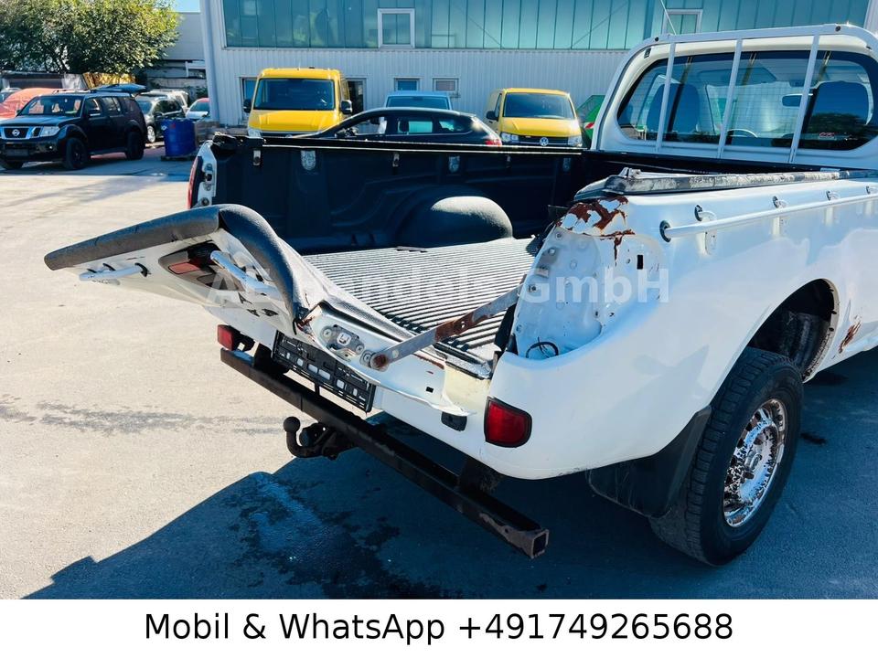 Mitsubishi L200 2008 — photo 7