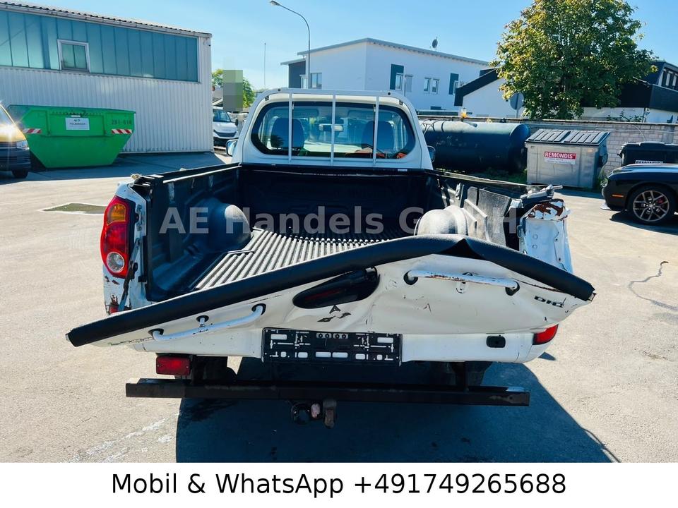 Mitsubishi L200 2008 — photo 9
