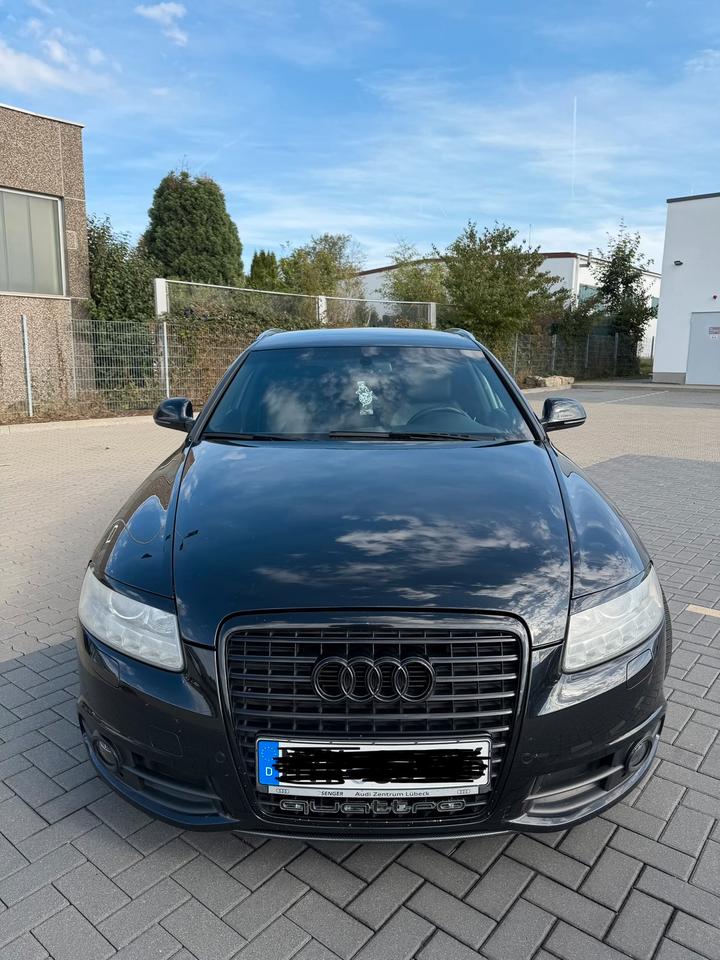 Audi A6 2010 — вигляд ззаду