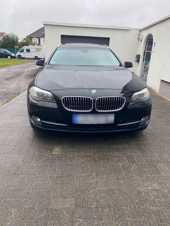 BMW 525 2011 — rear view