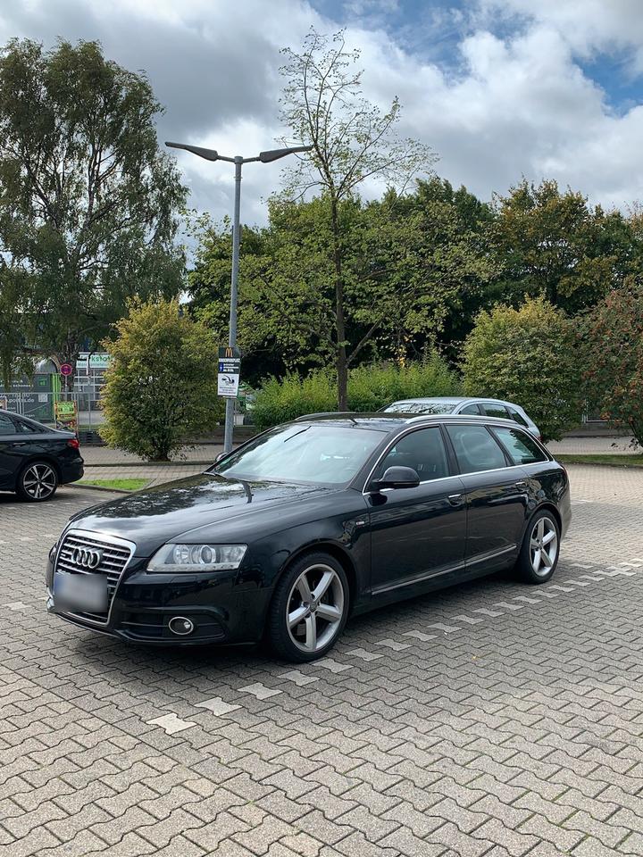 Audi A6 2010 — вигляд ззаду