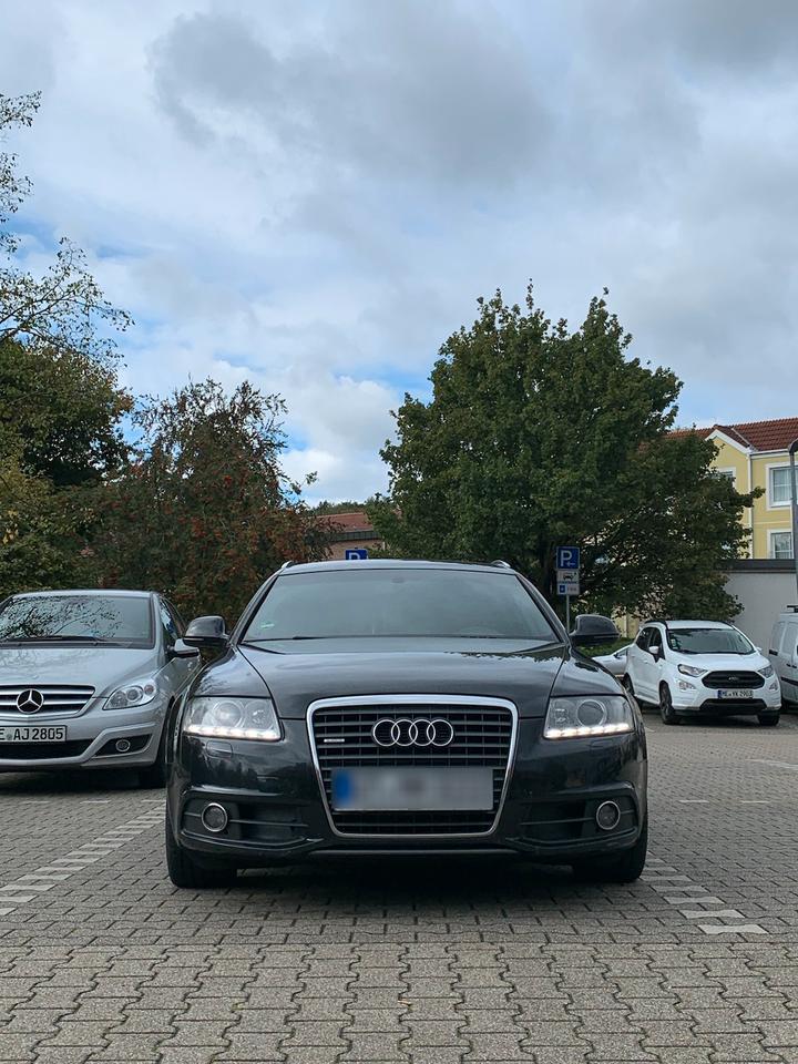 Audi A6 2010 — салон
