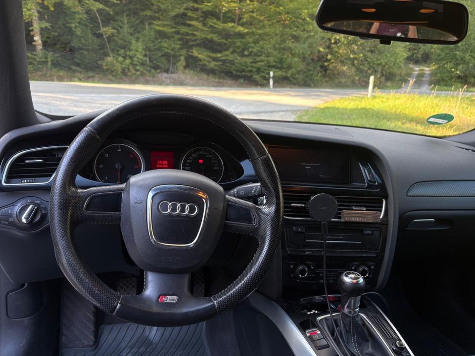Audi A4 2009 — photo 7