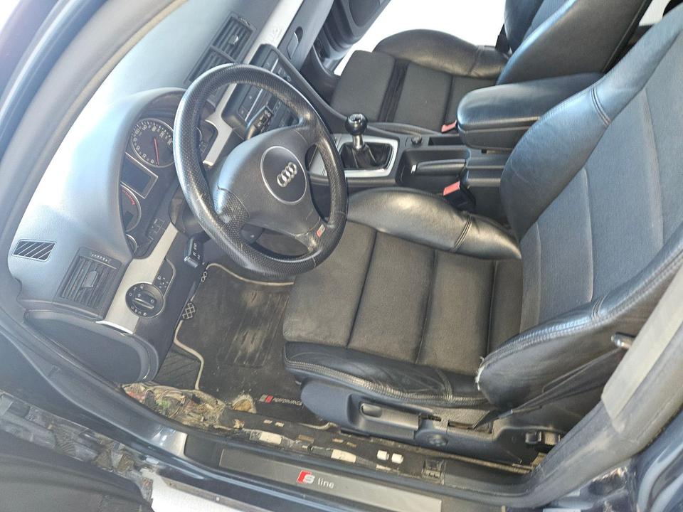 Audi A4 2004 — photo 14