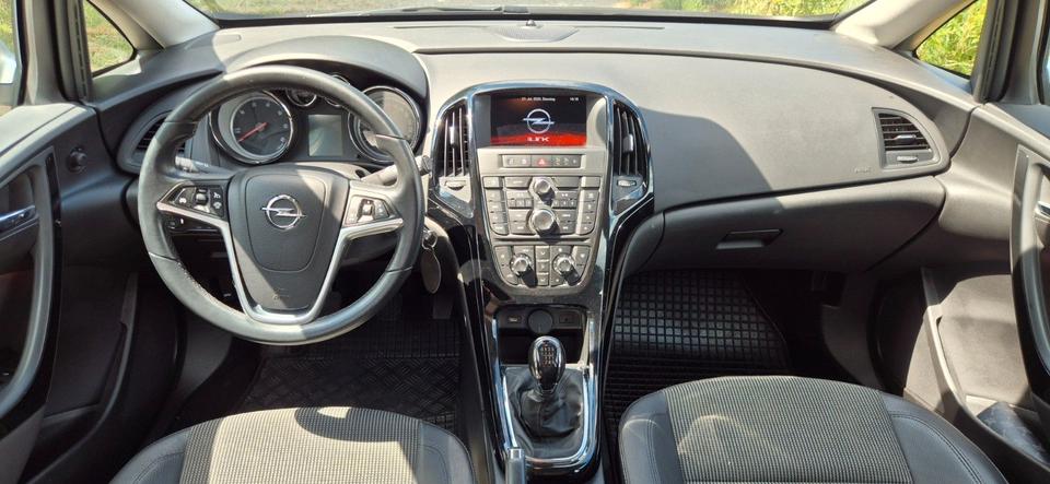 Opel Astra 2015 — фото 10