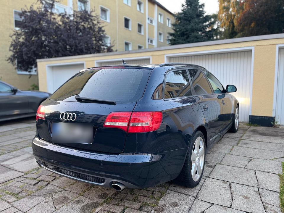 Audi A6 2009 — вигляд ззаду