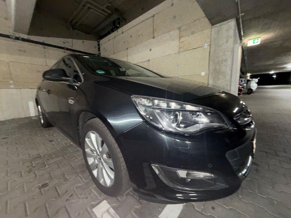 Opel Astra 2014 — фото 7