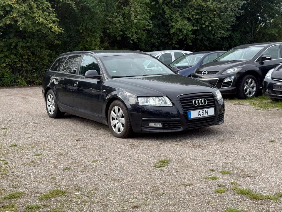 Audi A6 2010 — салон