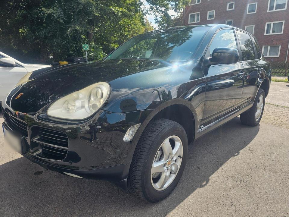 Porsche Cayenne 2005 — салон