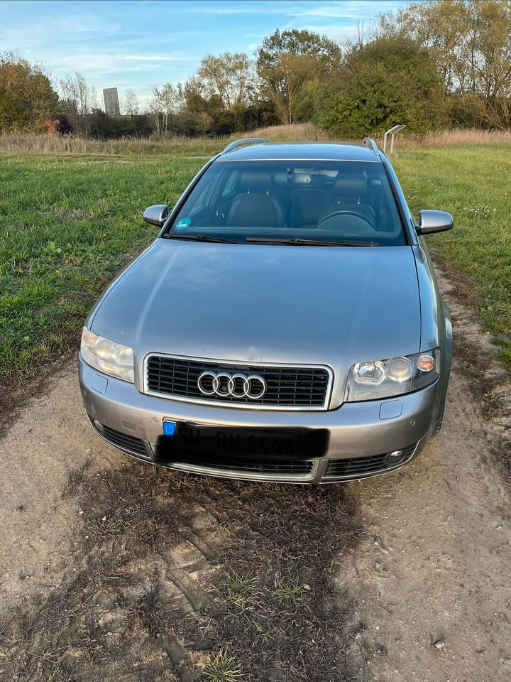 Audi A4 2004 — photo 12