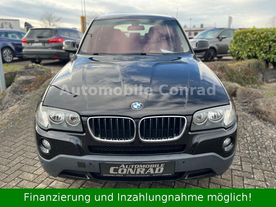 BMW X3 2010 — rear view