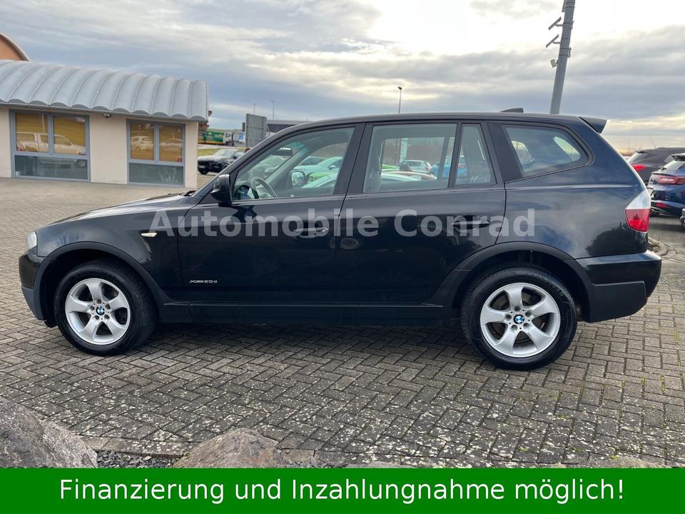 BMW X3 2010 — interior