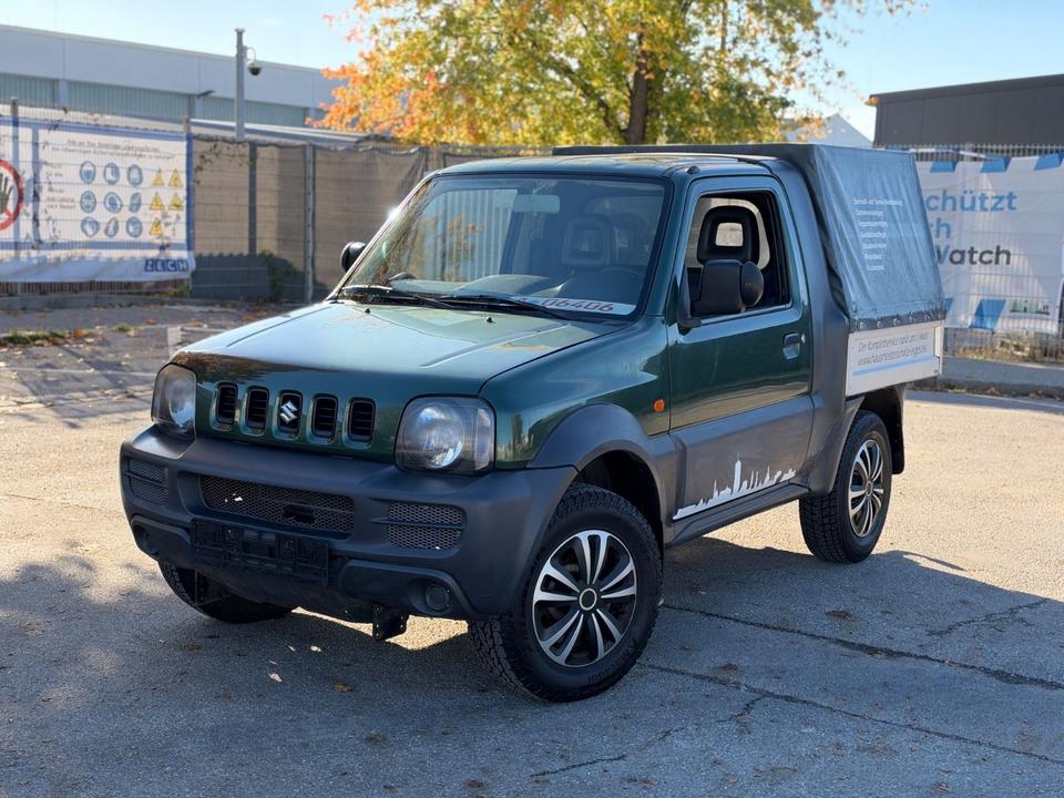 Suzuki Jimny 2011 — вигляд ззаду