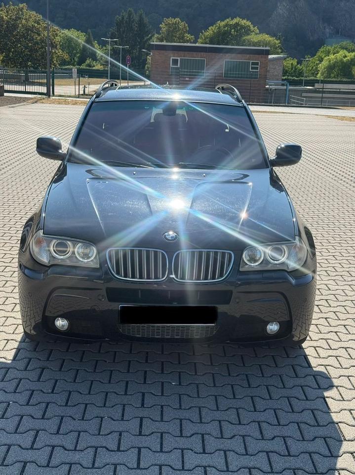 BMW X3 2010 — rear view