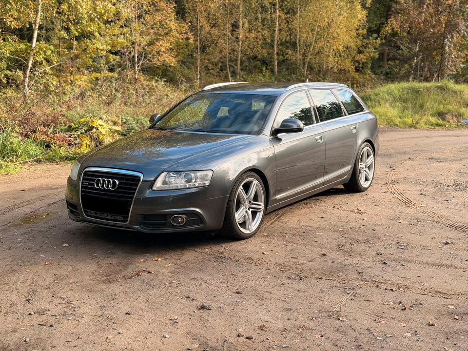 Audi A6 2011 — вигляд ззаду