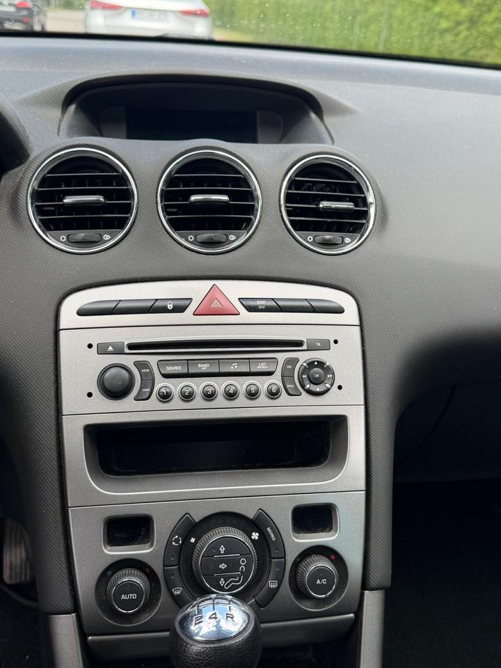 Peugeot 308 2012 — photo 12