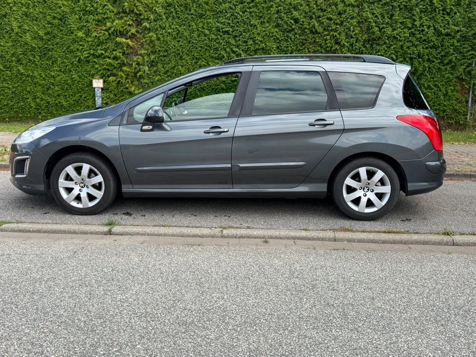 Peugeot 308 2012 — photo 7