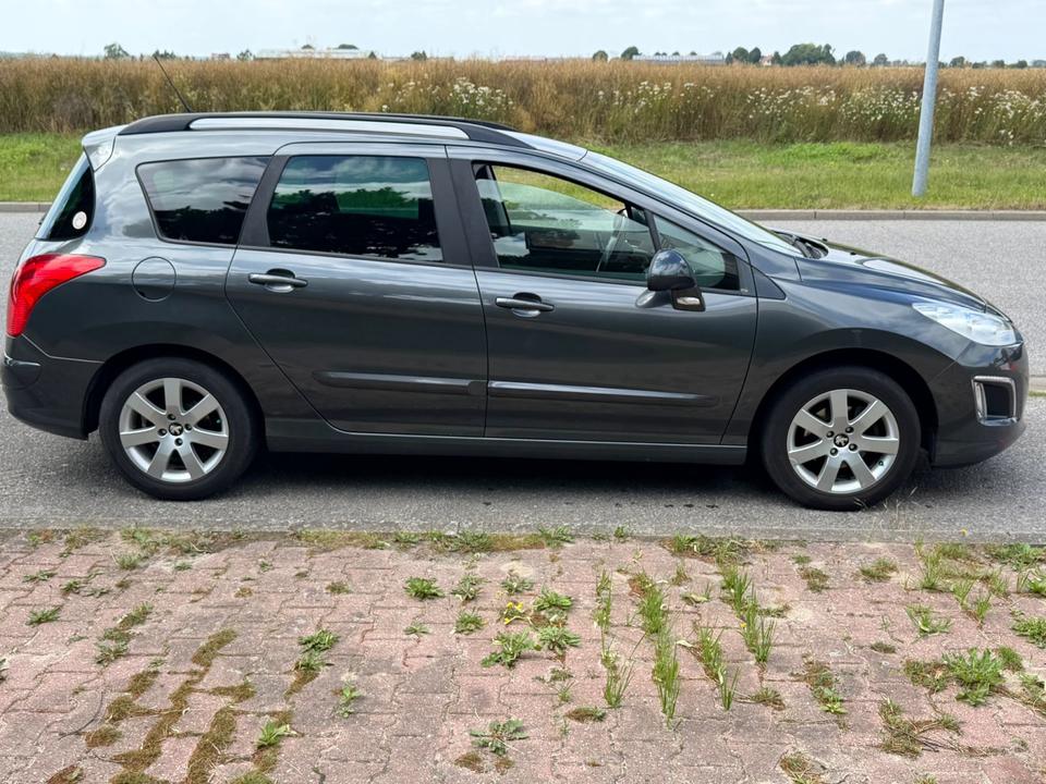 Peugeot 308 2012 — photo 9