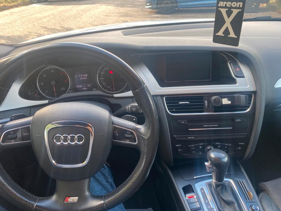 Audi A4 2010 — photo 6