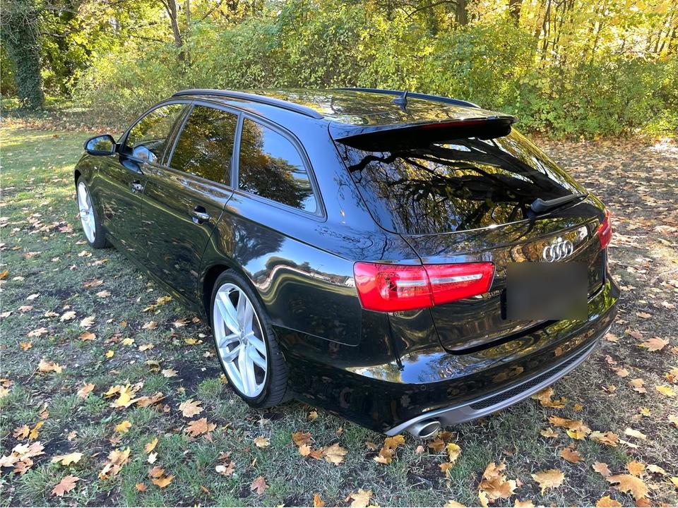 Audi A6 2014 — вигляд ззаду