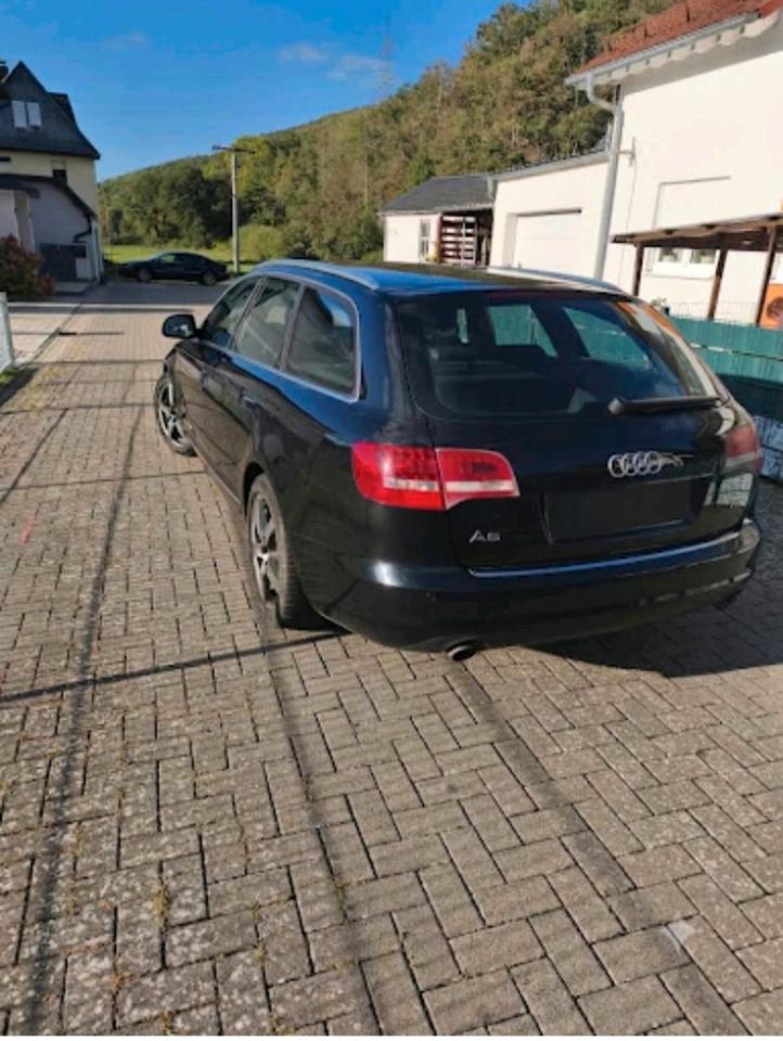 Audi A6 2011 — вигляд ззаду