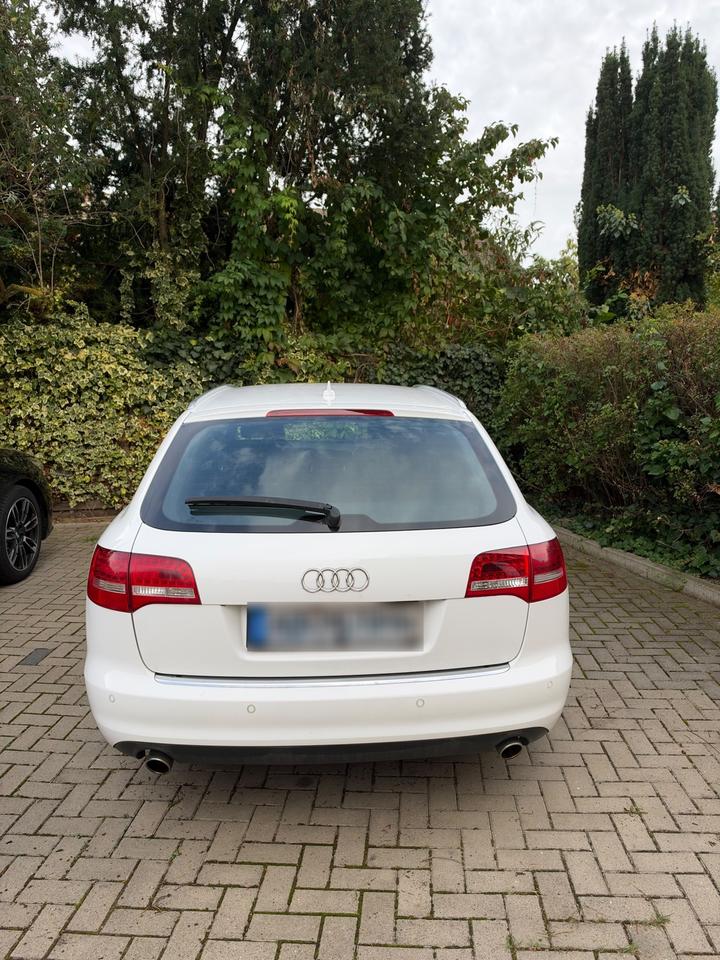 Audi A6 2009 — салон