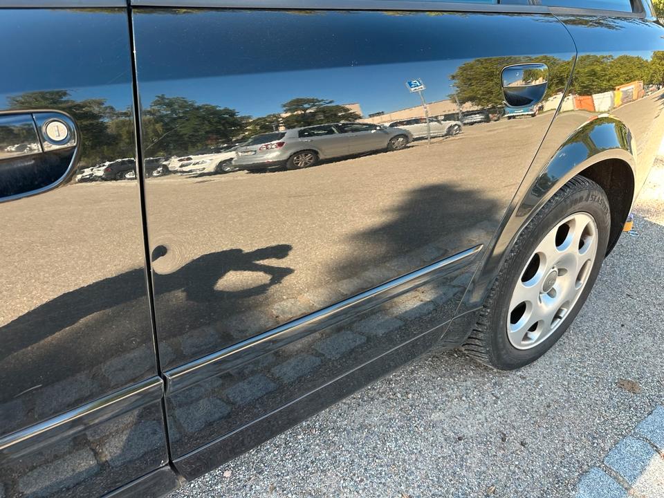 Audi A4 2004 — photo 13