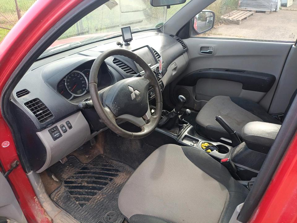Mitsubishi L200 2011 — photo 10