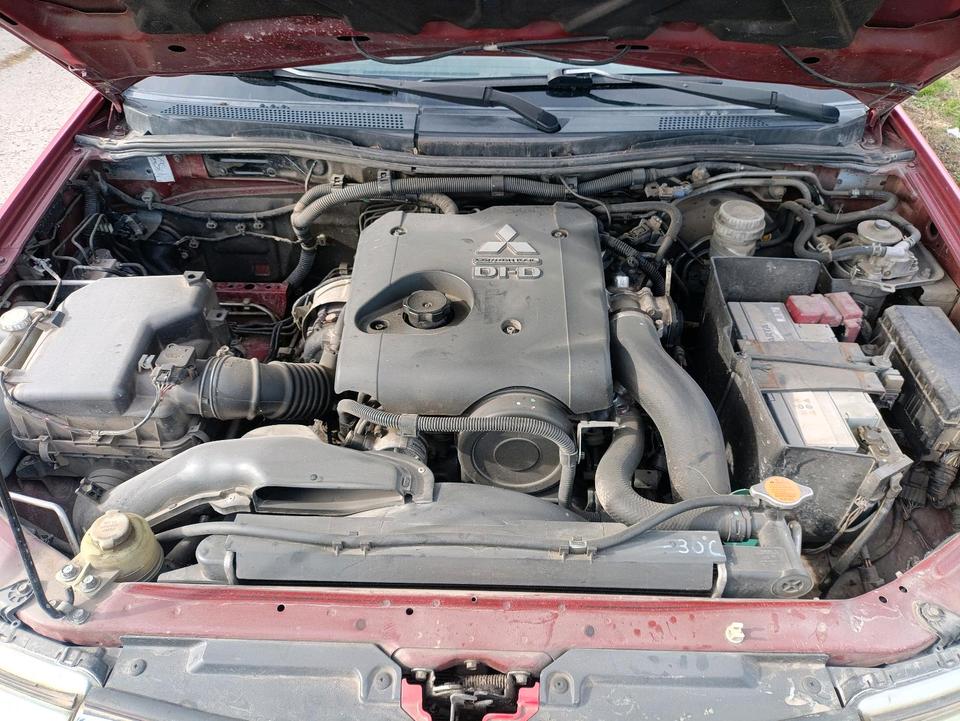 Mitsubishi L200 2011 — photo 11