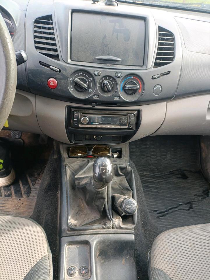 Mitsubishi L200 2011 — photo 9