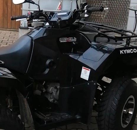 Kymco Quad Kymco MXU 300R ATV 2011 — rear view